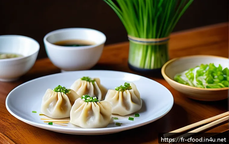 중식 냉동만두 가격비교 - A close-up image of a traditional Chinese jiaozi dumpling plate served in a modern French kitchen se...
